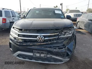 2021 Volkswagen Atlas SE with VIN 1V2WE2CA3MC240934, listed as a IAAI auction lot 41739347 with 44,485 mi miles and . Bid and sale history available at DreamBid. Image 12.