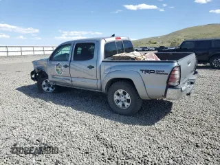 2015 Toyota Tacoma with VIN 3TMLU4EN2FM179631, listed as a Copart auction lot 57769855 with 106,288 mi miles and Salvage title. Bid and sale history available at DreamBid. Image 2.