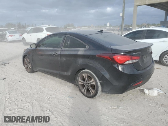 2014 Hyundai Elantra Coupe with VIN KMHDH6AH0EU026496, listed as a Copart auction lot 84742554 with 112,670 mi miles and Clean Title. Bid and sale history available at carsss.com. Image 2.