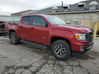 2021 GMC Canyon 4WD AT4 w/Cloth with VIN 1GTG6FENXM1185842, listed as a Copart auction lot 52574755 with 47,322 mi miles and Salvage Title. Bid and sale history available at carsss.com. Image 4.
