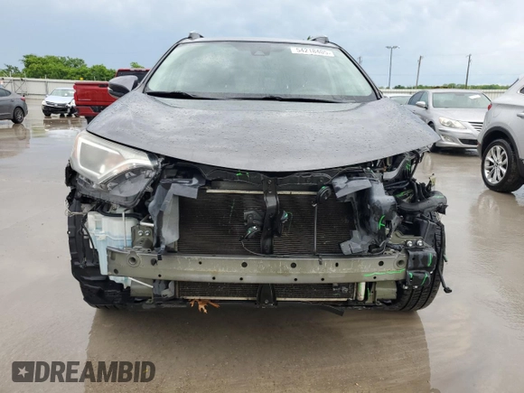 2018 Toyota RAV4 XLE with VIN 2T3WFREV6JW411935, listed as a Copart auction lot 54218405 with 123,831 mi miles and Salvage title. Bid and sale history available at DreamBid. Image 5.