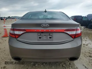 2013 Hyundai Azera z VIN KMHFG4JG5DA254372, wystawiony jako Copart lot #55731895 z przebiegiem 116 549 mil mil oraz Czysty tytuł • Clean title. Historia ofert i sprzedaży dostępna na DreamBid. Obrazek 6.