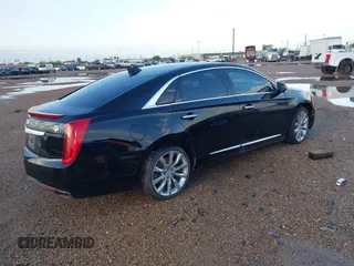 2017 Cadillac XTS Luxury with VIN 2G61M5S3XH9116856, listed as a IAAI auction lot 41893527 with 135,762 mi miles. Bid and sale history available at carsss.com. Image 4.