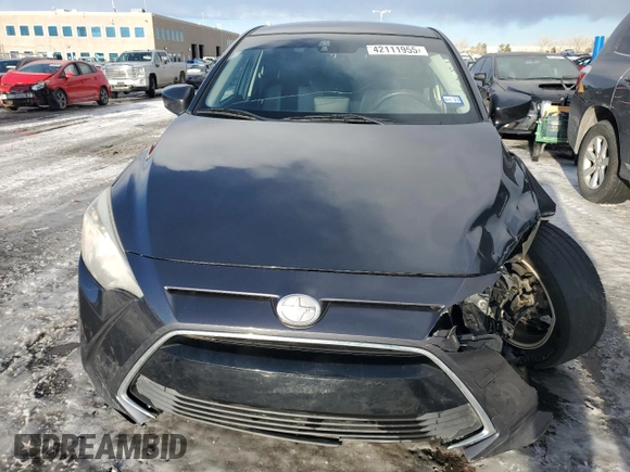 2016 Scion iA with VIN 3MYDLBZV1GY103531, listed as a Copart auction lot 42111955 with 104,882 mi miles and Salvage Title. Bid and sale history available at carsss.com. Image 5.