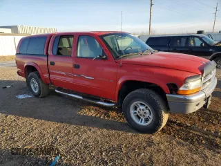 2000 Dodge Dakota Sport with VIN 1B7GG2AN2YS770376, listed as a Copart auction lot 42437485 with 196,906 mi miles and Salvage Title. Bid and sale history available at carsss.com. Image 4.