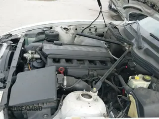 2003 BMW Z4 2.5i with VIN 4USBT334X3LS46762, listed as a IAAI auction lot 42570867 with 117,695 mi miles and . Bid and sale history available at DreamBid. Image 12.