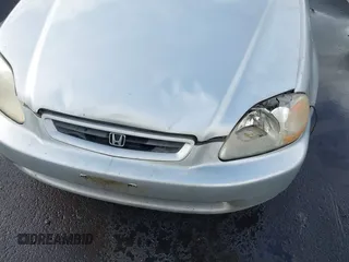 1998 Honda Civic DX with VIN 1HGEJ6221WL134982, listed as a IAAI auction lot 41904339 with 245,496 mi miles. Bid and sale history available at carsss.com. Image 6.