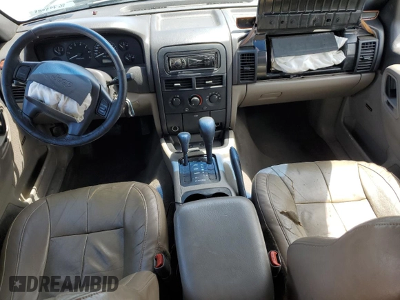 1999 Jeep Grand Cherokee Laredo с VIN 1J4GW58S5XC612309, выставлен на аукционе Copart как лот 56705085 с пробегом 200 004 миль миль и Списание • Salvage title. История ставок и продаж доступна на DreamBid. Изображение 8.