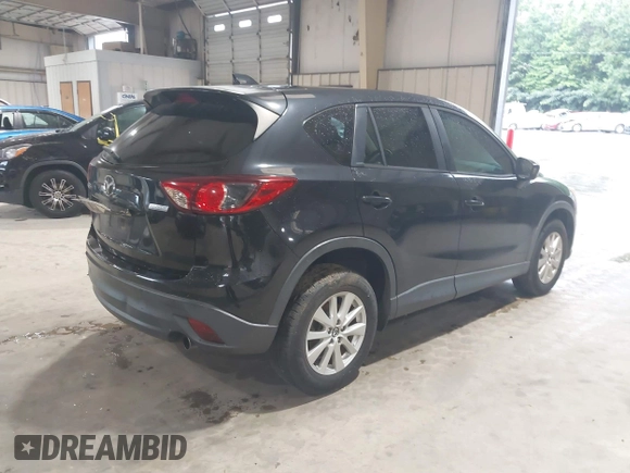 2013 Mazda CX-5 Sport with VIN JM3KE2BE3D0168842, listed as a IAAI auction lot 42653618 with 256,392 mi miles and . Bid and sale history available at DreamBid. Image 4.
