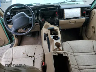 1999 Jeep Cherokee SE with VIN 1J4FF28SXXL641556, listed as a Copart auction lot 62605065 with Not provided miles and Salvage title. Bid and sale history available at DreamBid. Image 8.