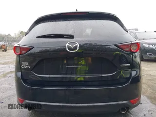 2020 Mazda CX-5 Touring with VIN JM3KFACM9L0770933, listed as a IAAI auction lot 41921464 with 75,997 mi miles. Bid and sale history available at carsss.com. Image 16.