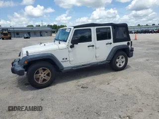 2007 Jeep Wrangler Unlimited X с VIN 1J4GB39147L158074, выставлен на аукционе Copart как лот 61356575 с пробегом 197 426 миль миль и Чистый • Clean title. История ставок и продаж доступна на DreamBid. Изображение 1.