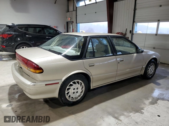 1995 Saturn SL with VIN 1G8ZK5271SZ238117, listed as a Copart auction lot 83723624 with 80,535 mi miles and Clean title. Bid and sale history available at DreamBid. Image 3.