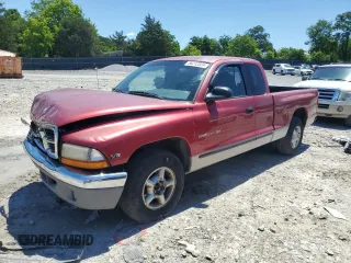 1998 Dodge Dakota SLT with VIN 1B7GL22X7WS660755, listed as a Copart auction lot 58212324 with 266,469 mi miles and Salvage Title. Bid and sale history available at carsss.com. Image 1.