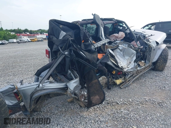 2015 Jeep Wrangler Unlimited Freedom with VIN 1C4BJWDG3FL682296, listed as a IAAI auction lot 42275536 with Not provided miles and . Bid and sale history available at DreamBid. Image 6.