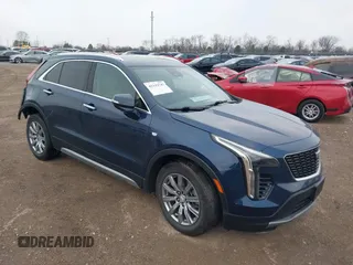2021 Cadillac XT4 FWD Premium Luxury with VIN 1GYFZCR41MF041306, listed as a IAAI auction lot 41143747 with 53,116 mi miles. Bid and sale history available at carsss.com. Image 1.