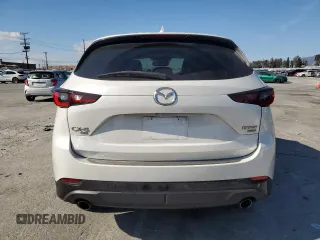 2022 Mazda CX-5 2.5 Turbo with VIN JM3KFBAY5N0525299, listed as a Copart auction lot 44736945 with 53,890 mi miles and Salvage Title. Bid and sale history available at carsss.com. Image 6.