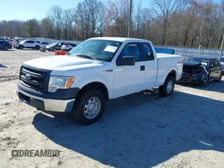 2014 Ford F-150 XL with VIN 1FTFX1EF0EKF01068, listed as a IAAI auction lot 41641910 with 212,728 mi miles. Bid and sale history available at carsss.com. Image 17.
