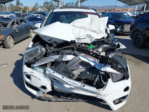2016 BMW X1 xDrive28i with VIN WBXHT3C32G5E51855, listed as a IAAI auction lot 41634237 with 69,101 mi miles. Bid and sale history available at carsss.com. Image 11.