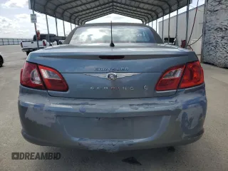2010 Chrysler Sebring Touring with VIN 1C3BC5ED9AN182007, listed as a Copart auction lot 51168905 with 124,495 mi miles and Salvage Title. Bid and sale history available at DreamBid. Image 6.