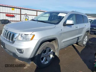 2011 Jeep Grand Cherokee 70th Anniversary with VIN 1J4RR4GTXBC718994, listed as a IAAI auction lot 41688158 with 121,680 mi miles. Bid and sale history available at carsss.com. Image 17.