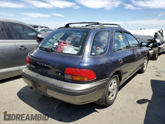 1996 Subaru Impreza Outback with VIN JF1GF4851TG811571, listed as a Copart auction lot 65650514 with 248,315 mi miles and Salvage title. Bid and sale history available at DreamBid. Image 3.
