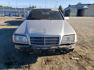 2000 Mercedes-Benz C 230 Kompressor with VIN WDBHA24G5YF935573, listed as a Copart auction lot 76331604 with 261,917 mi miles and Salvage Title. Bid and sale history available at carsss.com. Image 5.