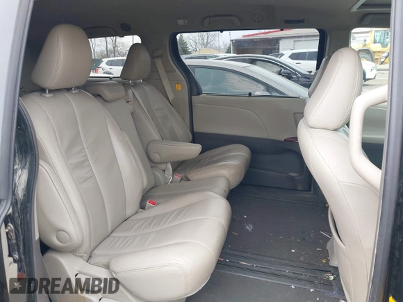 2011 Toyota Sienna XLE AAS with VIN 5TDYK3DC9BS071636, listed as a IAAI auction lot 41972332 with 204,477 mi miles and . Bid and sale history available at DreamBid. Image 8.