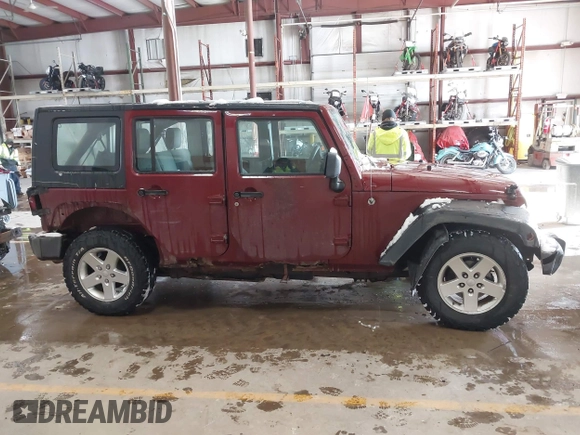 2009 Jeep Wrangler Unlimited X with VIN 1J4GZ39159L718649, listed as a IAAI auction lot 41395033 with 289,574 mi miles. Bid and sale history available at carsss.com. Image 13.