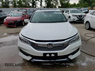 2017 Honda Accord Touring with VIN 1HGCR3F91HA009968, listed as a Copart auction lot 55858414 with 133,083 mi miles and Salvage title. Bid and sale history available at DreamBid. Image 5.
