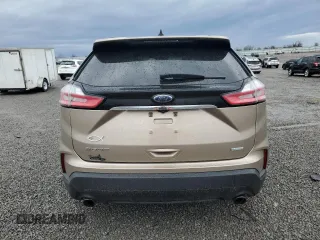 2020 Ford Edge SE с VIN 2FMPK3G9XLBA36467, выставлен на аукционе Copart как лот 51121035 с пробегом 86 437 миль миль и Списание • Salvage title. История ставок и продаж доступна на DreamBid. Изображение 6.