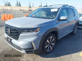 2023 Honda Pilot Elite with VIN 5FNYG1H83PB041264, listed as a IAAI auction lot 41637841 with 12,822 mi miles. Bid and sale history available at carsss.com. Image 2.