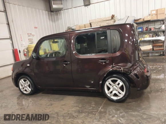 2009 Nissan Cube S z VIN JN8AZ28R39T124465, wystawiony jako IAAI lot #40769739 z przebiegiem 145 993 mil mil oraz . Historia ofert i sprzedaży dostępna na DreamBid. Obrazek 14.