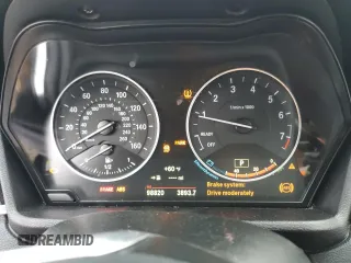 2017 BMW X1 sDrive28i with VIN WBXHU7C3XH5H38074, listed as a Copart auction lot 43088995 with 98,820 mi miles and Salvage Title. Bid and sale history available at carsss.com. Image 9.