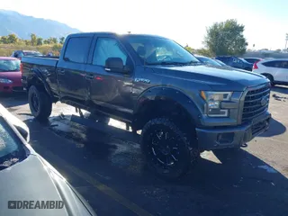2015 Ford F-150 XLT w/HD Payload Pkg with VIN 1FTFW1EF9FKD48453, listed as a IAAI auction lot 40694465 with 129,707 mi miles. Bid and sale history available at carsss.com. Image 1.