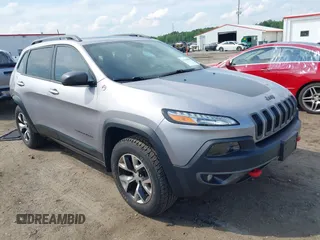 2018 Jeep Cherokee Trailhawk with VIN 1C4PJMBXXJD526398, listed as a IAAI auction lot 42105800 with 55,670 mi miles and . Bid and sale history available at DreamBid. Image 1.