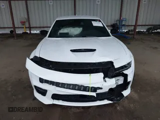 2023 Dodge Charger Scat Pack Widebody with VIN 2C3CDXGJ9PH516473, listed as a IAAI auction lot 41188167 with 38,021 mi miles and . Bid and sale history available at DreamBid. Image 12.
