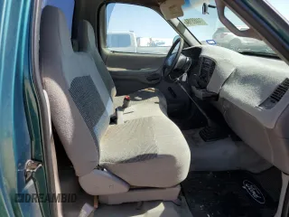 1997 Ford F-150 z VIN 1FTDF1728VNA87864, wystawiony jako Copart lot #74465184 z przebiegiem 205 501 mil mil oraz Szkoda całkowita • Salvage title. Historia ofert i sprzedaży dostępna na DreamBid. Obrazek 10.