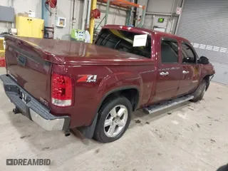 2013 GMC Sierra 1500 SLT with VIN 3GTP2WE70DG138799, listed as a IAAI auction lot 41555069 with 137,850 mi miles. Bid and sale history available at carsss.com. Image 4.
