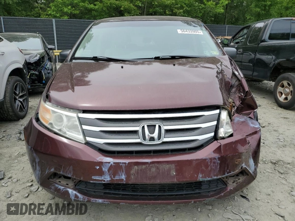 2011 Honda Odyssey LX z VIN 5FNRL5H29BB057920, wystawiony jako Copart lot #56433905 z przebiegiem 143 551 mil mil oraz Szkoda całkowita • Salvage title. Historia ofert i sprzedaży dostępna na DreamBid. Obrazek 5.