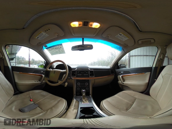 2010 Lincoln MKZ with VIN 3LNHL2GC0AR631012, listed as a IAAI auction lot 42003514 with 115,553 mi miles. Bid and sale history available at carsss.com. Image 21.