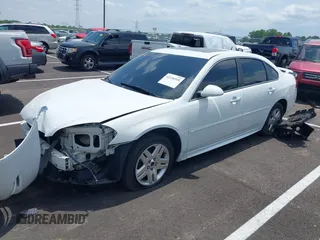 2014 Chevrolet Impala LT with VIN 2G1WB5E34E1101292, listed as a IAAI auction lot 42236918 with 273,654 mi miles and . Bid and sale history available at DreamBid. Image 2.