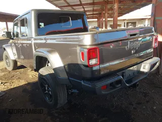 2021 Jeep Gladiator Willys with VIN 1C6HJTAG2ML507426, listed as a IAAI auction lot 41407608 with 49,554 mi miles and . Bid and sale history available at carsss.com. Image 3.