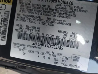 2014 Ford Fusion Titanium with VIN 3FA6P0K99ER235785, listed as a IAAI auction lot 41946638 with 212,939 mi miles and . Bid and sale history available at DreamBid. Image 9.