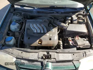 1999 Volkswagen Jetta z VIN 3VWSC29M0XM116062, wystawiony jako Copart lot #72177884 z przebiegiem 110 812 mil mil oraz Szkoda całkowita • Salvage title. Historia ofert i sprzedaży dostępna na DreamBid. Obrazek 11.
