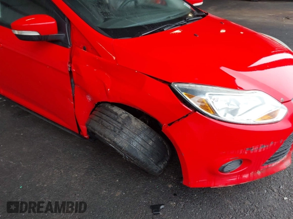 2013 Ford Focus SE z VIN 1FADP3F27DL111047, wystawiony jako IAAI lot #41946067 z przebiegiem 151 849 mil mil oraz . Historia ofert i sprzedaży dostępna na DreamBid. Obrazek 6.