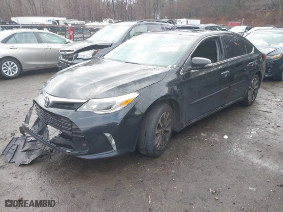 2016 Toyota Avalon Limited with VIN 4T1BK1EBXGU218710, listed as a IAAI auction lot 41019868 with 112,228 mi miles. Bid and sale history available at carsss.com. Image 17.