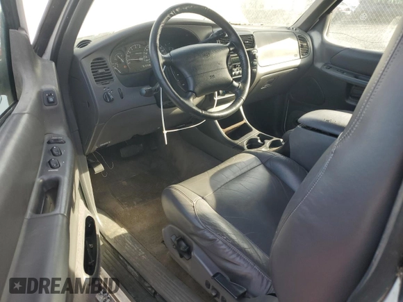 1999 Ford Explorer Sport with VIN 1FMYU24X7XUC50909, listed as a Copart auction lot 50254305 with 83,605 mi miles and Salvage title. Bid and sale history available at DreamBid. Image 8.