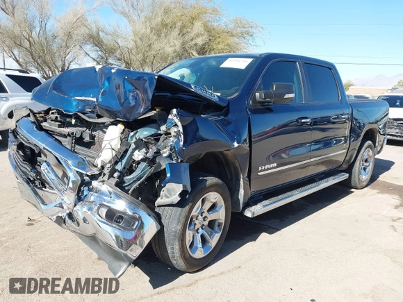 2019 Ram 1500 Big Horn z VIN 1C6RREFT4KN769061, wystawiony jako IAAI lot #41356744 z przebiegiem Nie podano mil oraz . Historia ofert i sprzedaży dostępna na DreamBid. Obrazek 6.