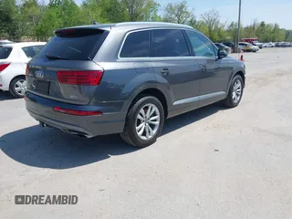 2018 Audi Q7 Premium Plus with VIN WA1LAAF70JD033878, listed as a IAAI auction lot 42203820 with 95,095 mi miles and . Bid and sale history available at DreamBid. Image 4.